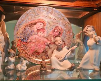 Hibel Plate with Lladro pieces.
