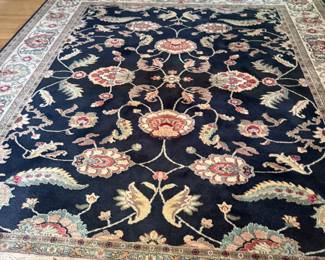 8'8 X 10 KARASTAN WOOL RUG. ANTIQUE LEGENDS ..ASHRA COLLECTION AGRA BLACK 2200-201 MODEL. MADE OF 100% NEW ZEALAND WOOL MACHINE WOVEN IN THE UNITED STATES. EXCELLENT CONDITION. LIFE EXPECTANCY WITH PROPER CAR IS 40-50 YEARS