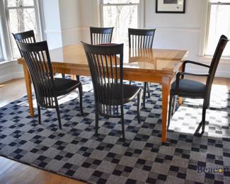 Modern dining table with geometric inlay