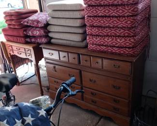 Patio furniture cushions.
Dresser. Needs tlc
Sewing machine cabinet