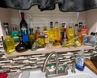 This house has a huge tequila bottle collection but none of the bottles contain alcohol… They have all been filled with water and food coloring to replicate contents for display purposes… I repeat: None of these are for human consumption and none contain alcohol!