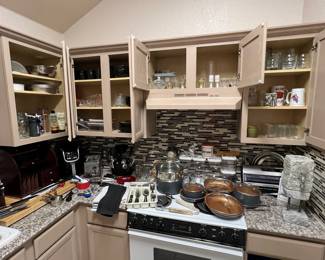 Lots of cooking supplies… Pots pans utensils