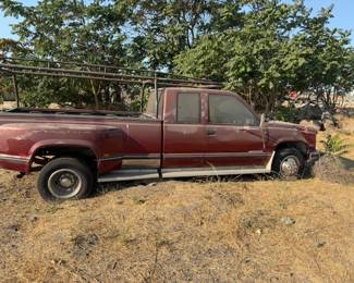 92 Chevy Dually, Has rebuilt 454 but no clutch. Registration is expired more than 10 years. Interior is very rough. Front passenger fender damage, nothing major.        Stick on the floor, unique hard to find and original engine, approx 200 miles or so on rebuild by Ace Transmission in Manteca. Clutch went out while the crew ( a rough bunch that always beat up the vehicles ) were offloading debris, I will sell very reasonable, I have title but not sure what it will take for registration, so it’s going as is with no help offered toward registration other than signing over title. It hauls trailers, boats etc so well that you will forget that you have a trailer. 