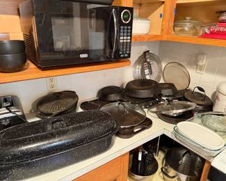 Cast iron cookware, roasting pan, toaster, microwave, cereal bowls, rice cooker, pots pans