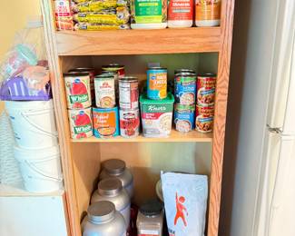 Canned goods, protein powder, economy size flour, seasonings, canned chili