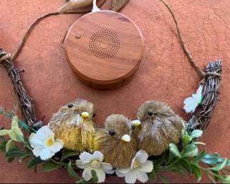 White noise machine and sweet birds wall hanging