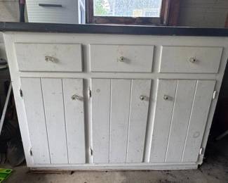 Wooden painted cabinet with Formica countertop