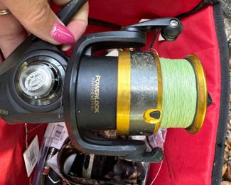 Fishing reels and rods, Plano fishing bag full of supplies