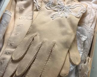 Dozens of antique gloves