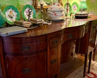 Late 1800s serpentine sideboard with wine holder drawer and silver drawers…flame mahogany