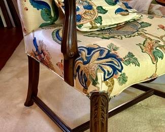 A pair of stunning hand carved Queen Anne curved arm chairs