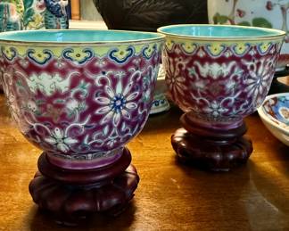 Pair of (RUBY-GROUND FAMILLE-ROSE CUPS SEAL MARK AND PERIOD OF JIAQING