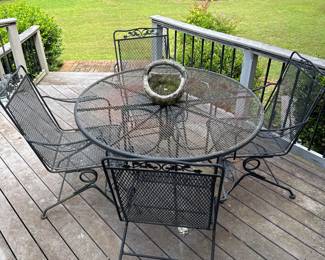 #32 - Wrought Iron Table w/Four Rocker Chairs