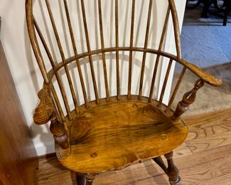 One Light Brown Windsor Arm Chair (no name)