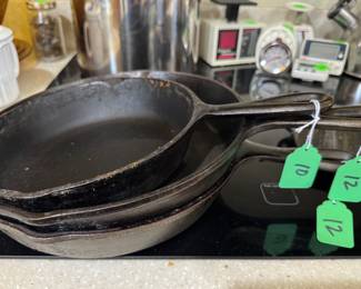 #158 - Cast Iron Skillets (One 8" unmarked $10 / Two 10" Lodge - $12 ea