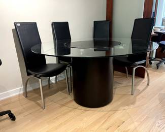 Modern Dining Table. 57' Diameter with built-in lazy Susan turntable. Great shape. Light scratches on base. $300