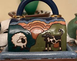 Collection of vintage hand made art pottery by Judy Miller including platters and butter dish