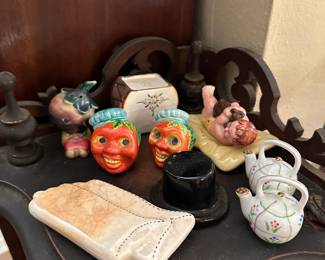 Collection of salt and pepper shakers including drum, gloves and top hat, piano and stool