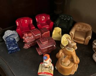 Collection of salt and pepper shakers including 3 sets of chairs, train set and kangaroo with kid