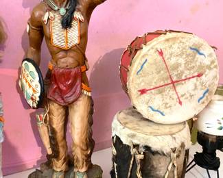 Sign Native American statue and drums
