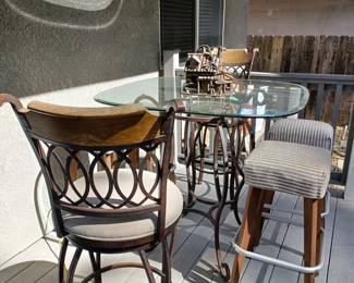 Hi top glass table with 2 swivel stools