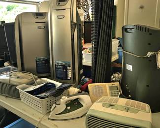 a selection of electronics: Purifier, radio, heather and more