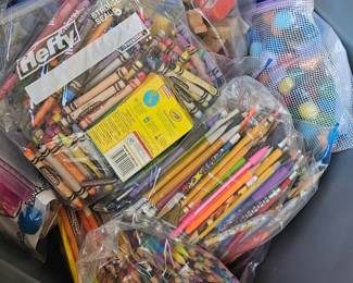 lots of teaching supplies, pens, markers, stickers, storage containers, books and other fun stuff