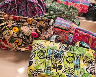 large selection of Vera Bradley bags