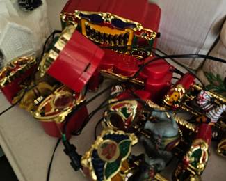 Vintage Christmas carousel, lights up, moves and plays Christmas tunes