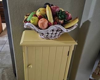 cute small cabinet with Capo Di Monte fruit basket