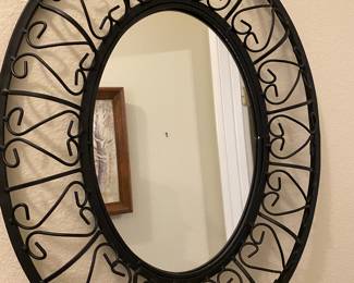 Mirror with metal surround 