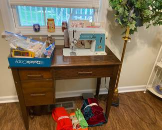 Sewing machine cabinet & Singer sewing machine in painting bedroom