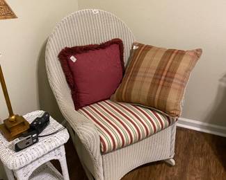 Wicker chair with cushion, pillows, and wicker table 