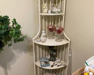 Wicker shelf with items (painting bedroom)