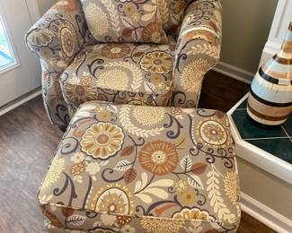 Lovely cushioned chair with matching stool. Very nice & comfortable!