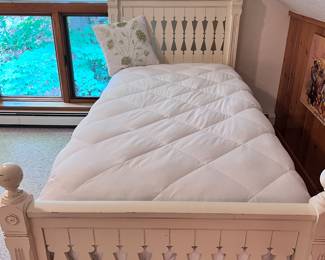 2 MATCHING TWIN SIZE BEDS WITH CREAMISH COLORED HEAD AND FOOTBOARDS, MATTRESSES AND FRAMES. PRICED INDIVIDUALLY