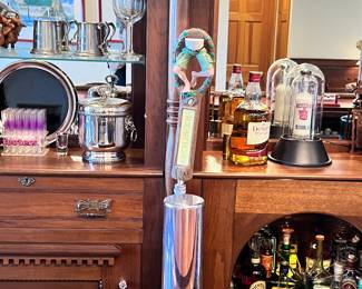 KEGERATOR, MANY BAR TAP HANDLES. VIEW OF BACK BAR! BEAUTIFUL ROUND GLASS CABINET DOOR FRONT