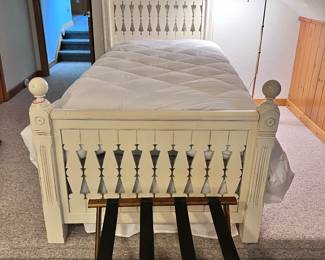 2 MATCHING TWIN SIZE BEDS WITH CREAMISH COLORED HEAD AND FOOTBOARDS, MATTRESSES AND FRAMES. PRICED INDIVIDUALLY