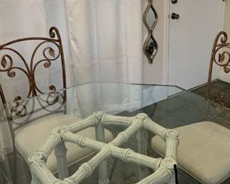 Glass top table with chairs.