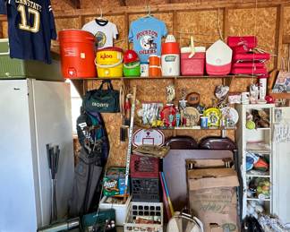 Coolers; Water Coolers; STL Cardinals Staduim Seats; STL Cardinals Baseball Hat; Tackle Box; Fishing Poles; Crates Full of Sports Illustrated and ESPN Magazines ; Card Table and 4 Chairs; Vintage Wooden Golf Clubs with Bag and Cart; Golf Clubs; Tennis Racquets; Trophies; Bowling Bags; Metal Storage Cabinet; Cleats; Baseballs; Softballs; Tennis Balls; Racquet Balls; Baseball Gloves; Houston Oilers T-Shirt; Easton Bat; Stohs Koozies; Frisbees; Autograph Blues Picture; St. Louis Hawks Autographed Picture; Vintage Tempo King Size Fiberglass Trays; Hockey Stick; Hockey Pucks; 1982 St Louis Cardinals Newspapers; Autographed Lou Brock Picture Card; Bowling Patches; Super Bowl XXII 1/31/88 Hat