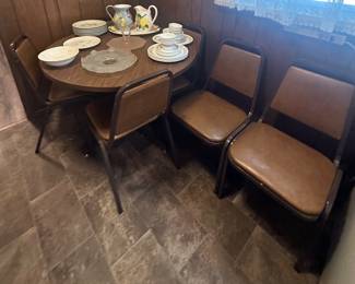 Round Table and 6 Chairs; Cake Plates; Corelle Dinnerware Woodland Brown; Decorative Pitchers and Platter; Royal Ironstone by Royal China Star Glow Plate; Stone Crest Andre Ponche" 204 April Song Plates