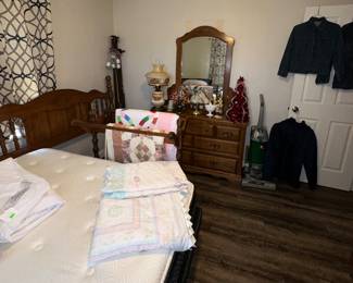 Queen Mattress; Ease Queen Platform Adjustable Bed Frame; Mattress Pad; Baby Quilts; Quilts; Quilt Rack; Bed Rails; Headboard; Dresser with Mirror; Gone with the Wind Style Lamp; Hoover Vac; Vintage Levis Denim Jackets; Ladies Totes Jacket