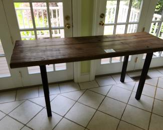 Large table. About 6 feet long and 42" tall. $75.00. Top detail shown in next picture.