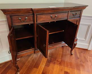 Server by Liberty Furniture. Excellent condition. 56" wide x 16" deep (from wall). $100.00