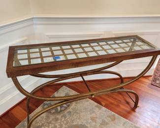 Metal and glass hall/side table, top is removable, 48" wide $50.00. Note: also 1 matching lower, square end table available.