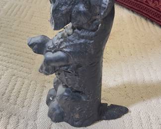 a vintage cast iron Scottish Terrier, also known as a "Scottie" dog, doorstop