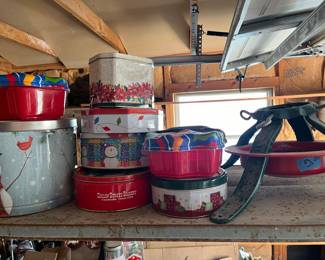 Christmas tree stand and tins.