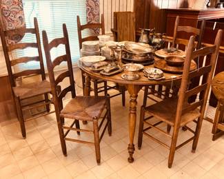 Set of 5 ladder-back side chairs and dining table with 2 leaves (Can be purchased separately)...