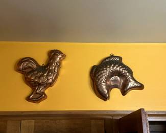 More vintage copper jelly molds, cockerel and fish shapes