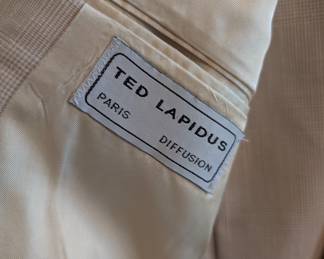 Closeup of men's vintage Ted Lapidus Paris Diffusion double-breasted blazer, light tan plaid